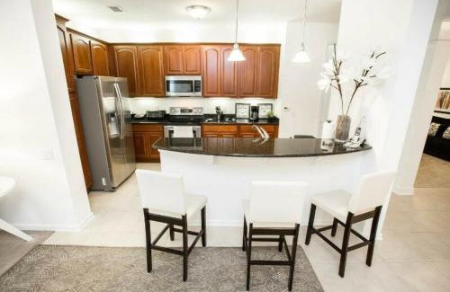 Florida Central Atlantic Coast House | Modern Vacation Apartment with a Lake View at Vista Cay Resort VC4816