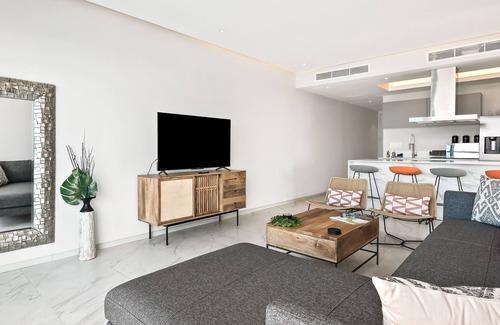 Isla Iguana Apartment | Modern, water & mountain view condo with huge balcony, rooftop pool, gym, & spa