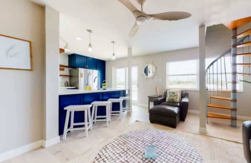 Port Isabel Apartment | Modern Waterfront Escape with a Deck & BBQ Grill