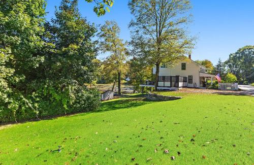 Versailles Villa | Modern Waterfront Retreat with Hot Tub & Pond Views