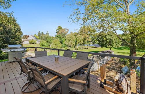 Versailles Villa | Modern Waterfront Retreat with Hot Tub & Pond Views