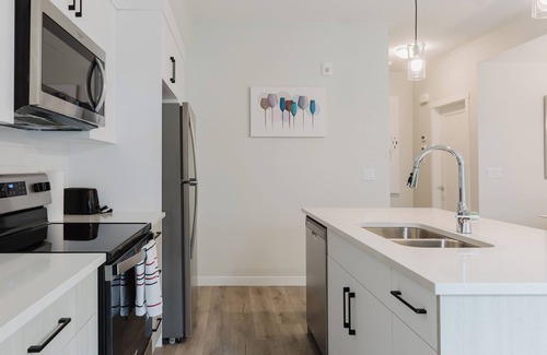 Southwest Calgary House | Modern2Bedroom 2BathTownhouse with Garage in Belmont Urban Living at Its Finest