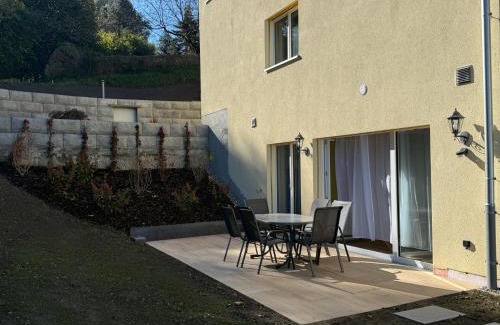Dierikon Apartment | Moderne Familienwohnung mit Garten & E-Ladestation