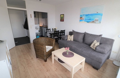 Horumersiel Apartment | Modernized holiday apartment with a view from the balcony of the idyllic Horum low