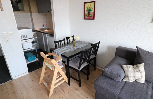 Horumersiel Apartment | Modernized holiday apartment with a view from the balcony of the idyllic Horum low