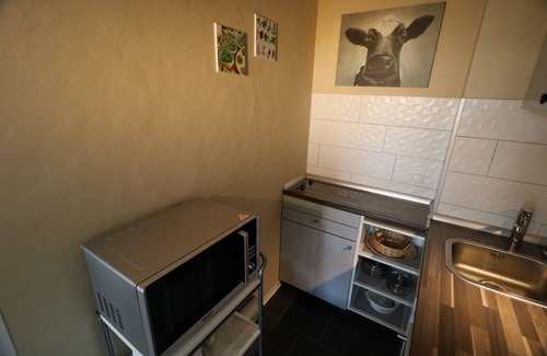 Horumersiel Apartment | Modernized holiday apartment with a view from the balcony of the idyllic Horum low