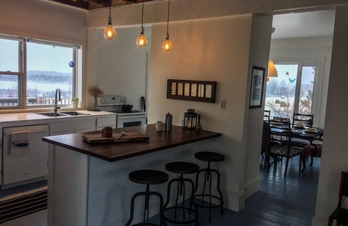 Amherst House | Modernized Waterfront Farmhouse with Wood Stove on 9 Acres of Land