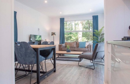 Ede Ski Chalet | ✓ Module Flat Roof at Bospark Ede ✓ Holiday home for 4 people ✓ Located in Ede (Gelderland) ✓ Holiday resort in the Veluwe region ✓ Book directly at the resort