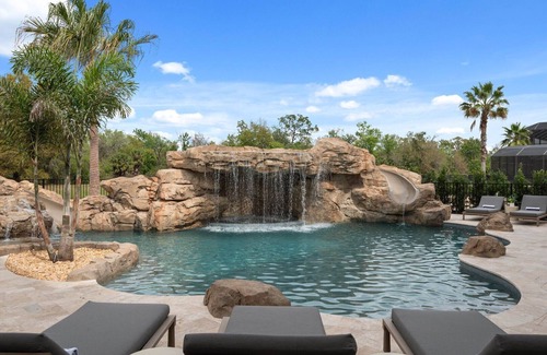 Reunion House | Morlando Three floor rocket ship, luxurious interior, back yard oasis with pool