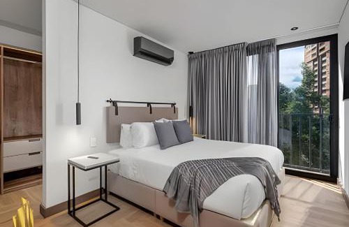 La Florida Apartment | Morph 302 - Apt moderno con techos altos, BBQ