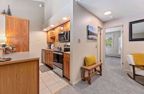 Estes Park Condo | Mountain Pines Chalet: Nestled along Fall River