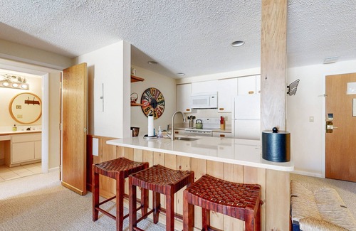 Lincoln Condo | Mountain & river view condo w/pool, hot tub, game room & walk to ski lift