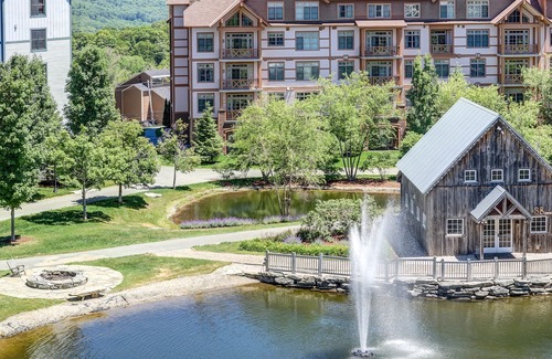 Stratton Mountain Apartment | Mountain-side studio with pool, hot tub, sauna, elevator & fireplace