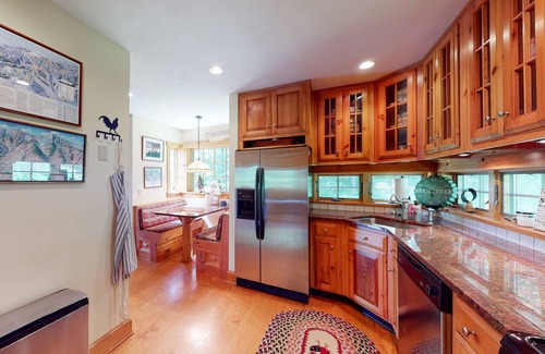 Warren House | Mountain-view house near skiing with hot tub, fireplace, balcony, & firepit