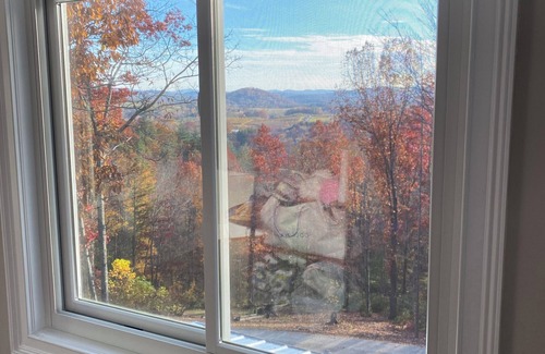 Hendersonville House | Mountain View’s, dual water fall Koi pond and private theater.