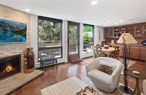 Aspen Condo | Mountain Views On Main St Aspen. Walk to Everything! Balcony, Gas FP, Elevator, Covered Parking, HT