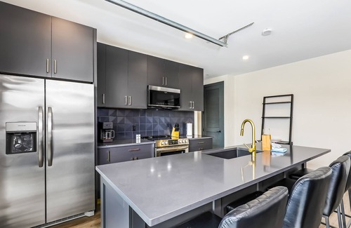 Rolling Mill Hill Condo | Muse | Sleek & stylish condo with central AC, full kitchen & fitness room