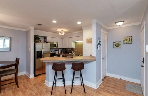 Port Aransas Condo | MUSTANG ISLAND POOLSIDE PARADISE - Boardwalk to beach, heated pool. hot tub!