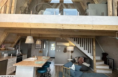 Aspy Bay House | Mystical Beachfront Chalet , Hot tub , Sauna and Heated Container Pool