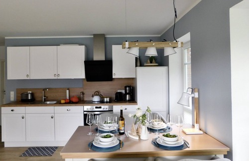 Greetsiel Apartment | Nagelneue Eg-ferienwohnung Direkt an der Greetsieler Gracht mit Wasserzugang