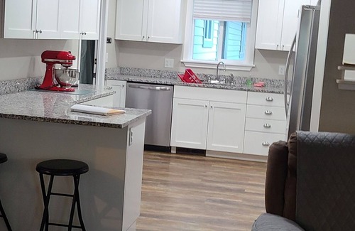 Price House | Nana's Place is a beautiful family, pet-friendly home with a fenced back yard.