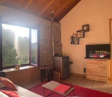 Sande House | Nascente, place in nature next to a waterfall