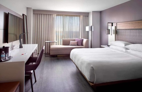 Downtown Hotel | Near Red Hat Amphitheater + Dining. Pool. Gym.