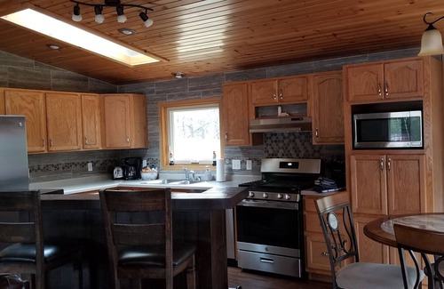 Sturgeon Bay House | Nestled in the woods among the sand dunes