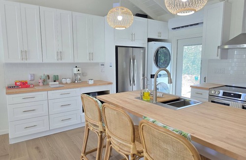 Great Exuma Villa | NEW 2 bdrm Sunset Villa on 1+ acre tropical garden directly on Hoopers Beach