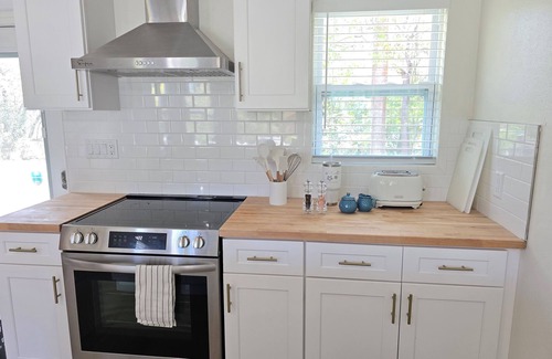 Great Exuma Villa | NEW 2 bdrm Sunset Villa on 1+ acre tropical garden directly on Hoopers Beach