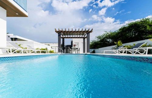 Bubali House | NEW 3BR 2BA Modern Oasis 3-min to Eagle Beach