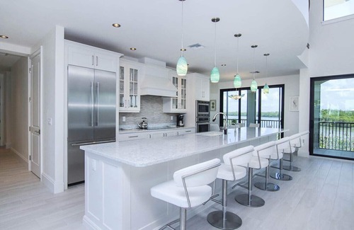 Wulfert House | New Bayfront Luxury Home with Private Pool, Spa & Panoramic Views