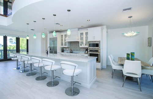 Wulfert House | New Bayfront Luxury Home with Private Pool, Spa & Panoramic Views