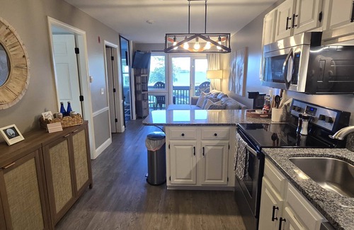 Gilford Condo | New Beachfront Condo-Walk to Bank of NH Concerts