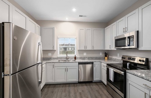 Grandville Condo | New Build 4BR 4BA Two Condo w Patio and Garage