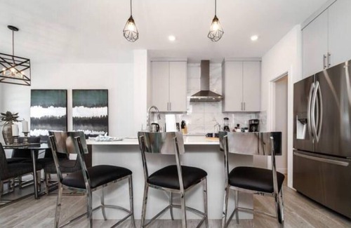 Leduc County House | New - Chic Modern Home - King bed - Foosball - Sleeps 8!