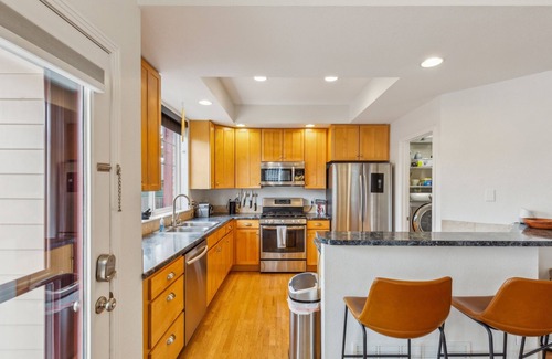Longmont House | NEW! Cozy home with jacuzzi tub, fireplace and gym
