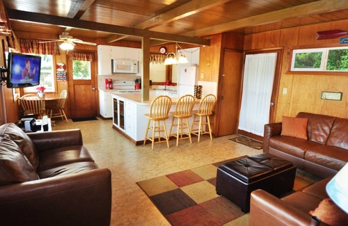 Dunes City House | New Listing! Adorable lakefront cabin, private dock, hot tub, gas grill, amazing views