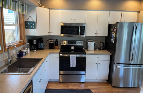 Colington Harbour Cottage | NEW LISTING: Breathtaking Waterfront Views w/Private Dock