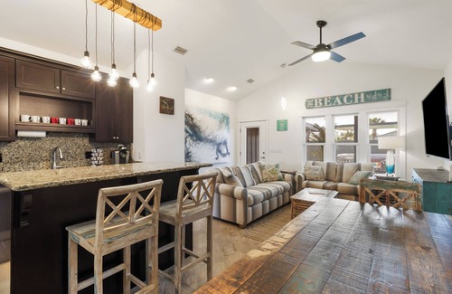 Port St. Joe House | NEW LISTING! Special Shell features 2BD/2BA w/private, fenced yard, swim spa, outdoor fireplace!
