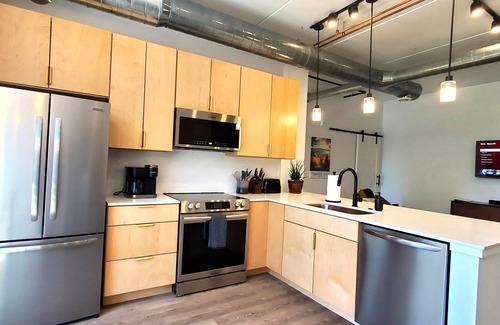Traverse City Condo | NEW Modern Condo, King Beds, Rooftop Hot Tubs, Near Downtown, Quiet!