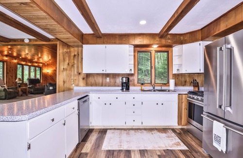 Lake Tomahawk House | NEW! Private, waterfront home with glass enclosed sunroom, gazebo and fire pit.