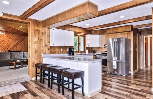 Lake Tomahawk House | NEW! Private, waterfront home with glass enclosed sunroom, gazebo and fire pit.
