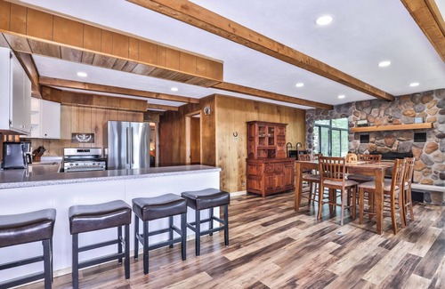 Lake Tomahawk House | NEW! Private, waterfront home with glass enclosed sunroom, gazebo and fire pit.