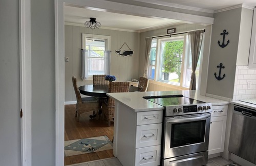 Silver Beach Cottage | New Silver Beach Cottage just a short walk to association beach and harbor!