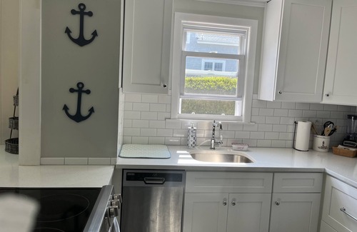 Silver Beach Cottage | New Silver Beach Cottage just a short walk to association beach and harbor!