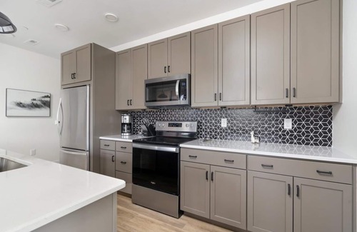 Traverse City Condo | NEW Slabtown Suites 301