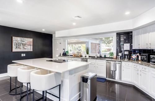 Castle Hills House | New! Sleeps 16! Heated Pool, Outdoor Movie Theater, Game Room, Putting Green!
