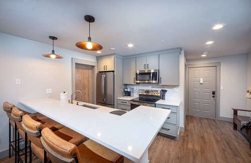Whitefish House | Newley renovated ski-in/ski-out duel condo w communal hot tub and great views