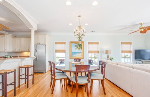 Sunset Beach Cottage | Newly redecorated ocean views, 3 stop elevator, swimming pool deep water canal.